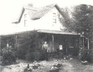 Original photo of the Wood House taken circa 1900. Susan Wood (Walter's mother) is shown in the front yard